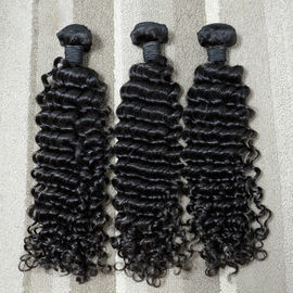 il groviglio originale dei capelli umani di estensioni malesi vergini ricce dei capelli 7A libera