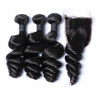 Il nero naturale di Remy 8A di estensioni malesi reali dei capelli per i capelli ricci delle donne