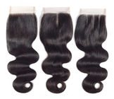 I capelli lunghi ondulati brasiliani vergini di 100% impacchettano tre parti 4 x chiusura 4